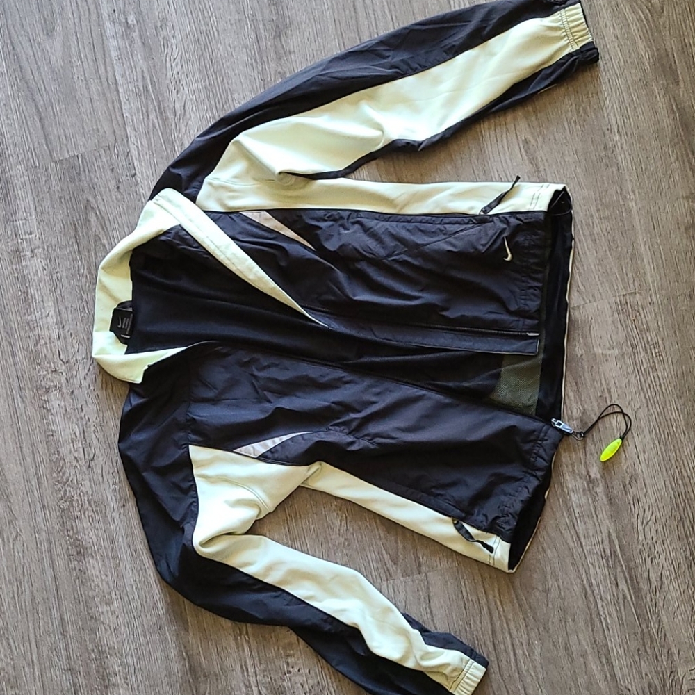 Women size small NIKE windbreaker yellow/black rip cord drawstring